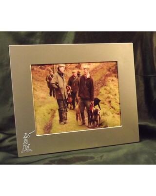 Large single image frame with small pewter Embellishment.