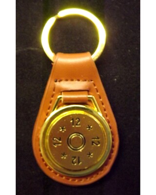 Gold plated representation of a head stamp on a leather key fob