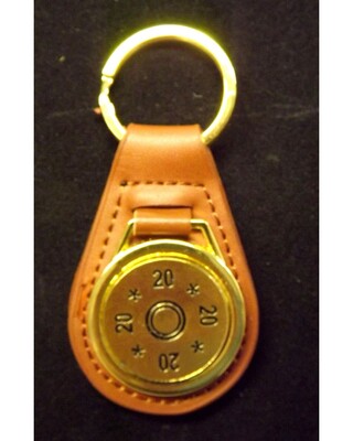Gold plated representation of a head stamp on a leather key fob