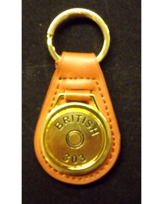 Gold plated representation of a head stamp on a leather key fob