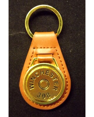Gold plated representation of a head stamp on a leather key fob
