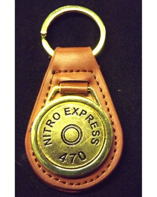 Gold plated representation of a head stamp on a leather key fob