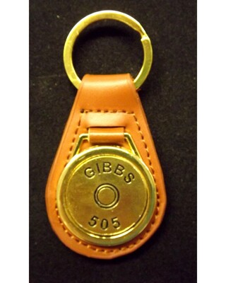 Gold plated representation of a head stamp on a leather key fob