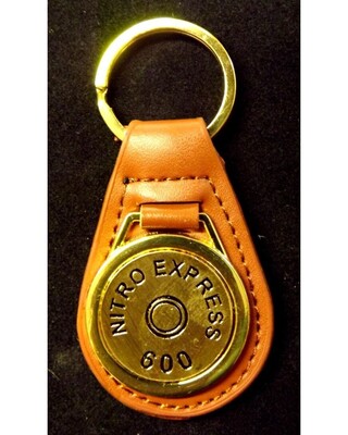 Gold plated representation of a head stamp on a leather key fob