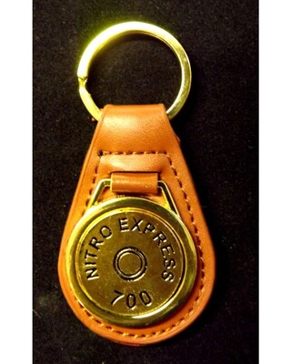 Gold plated representation of a head stamp on a leather key fob