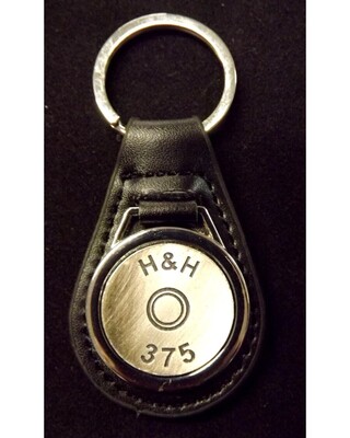 Antique Silver plated representation of a head stamp on a leather key fob