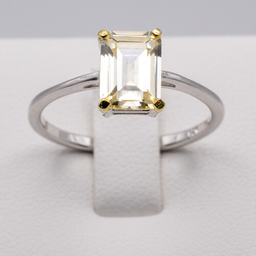 Rectangle cut solitaire yellow zirconia set on rhodium plated 925 sterling silver ring