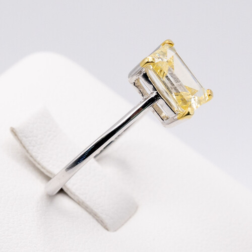 Rectangle cut solitaire yellow zirconia set on rhodium plated 925 sterling silver ring