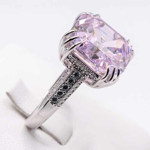 Pink Moissanite stone set on rhodium plated 925 Sterling Silver Ring
