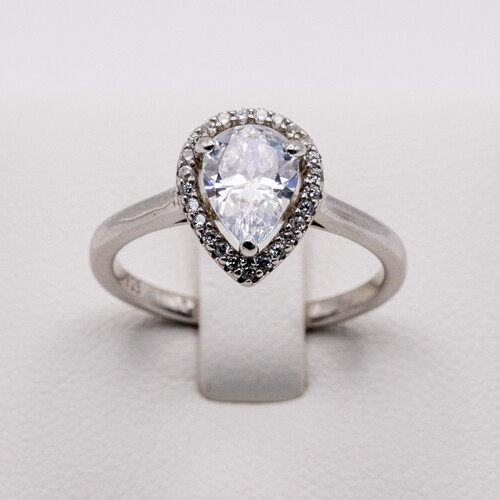 Almond cut zirconia bordered with multi paved stones