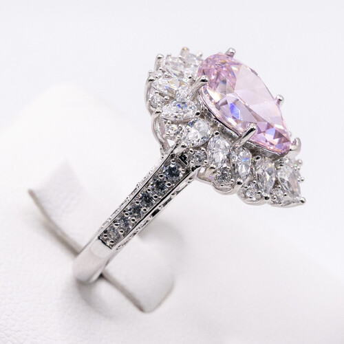 Pink moissanite stone set on rhodium plated 925 sterling silver ring