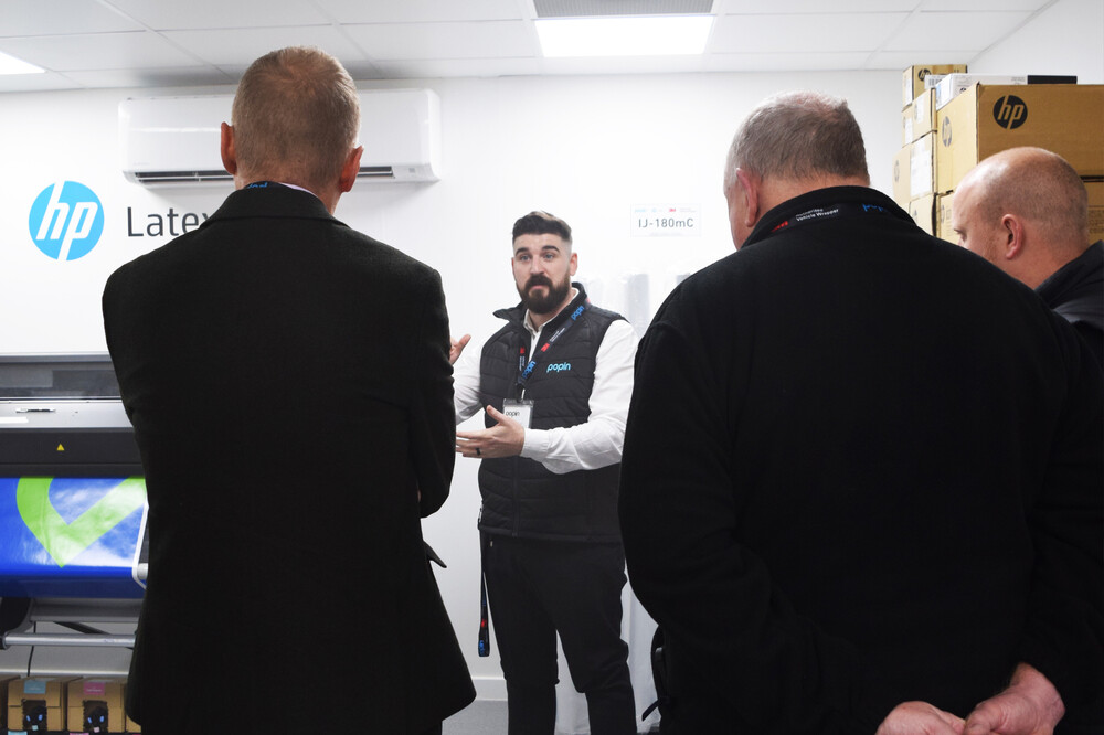 Guests watching a presentation at the Popin Graphics 2023 open day in Cardiff