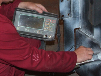 Carrying out NDT  Ultrasonic testing on a lifting point weld situated on a offshore fabrication.