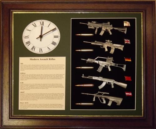 Wall mounted 1/6 pewter gun collection with clock