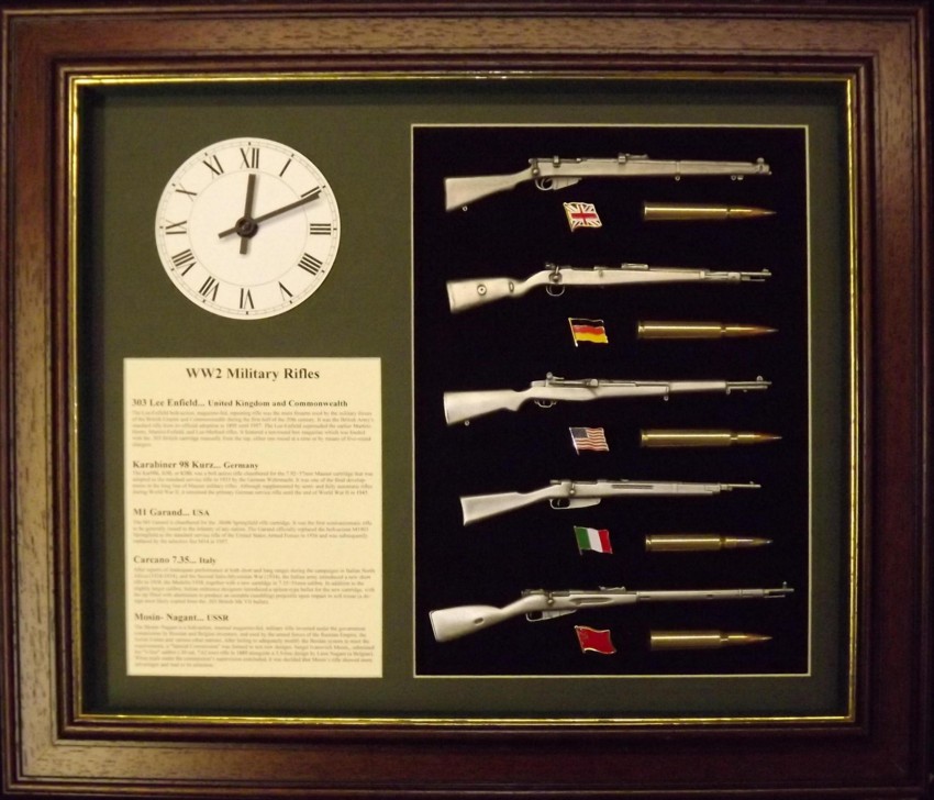 Wall mounted 1/6 pewter gun collection with clock