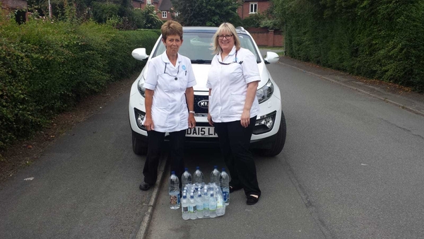 Burst Water Main In Tattenhall - TLC take bottled water to our service users.