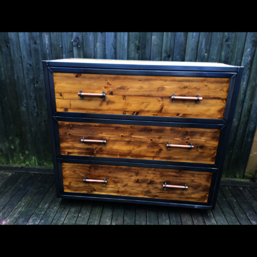 Industrial chest of drawers with copper handles and metal detail