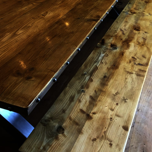 Huge industrial reclaimed wood table and benches