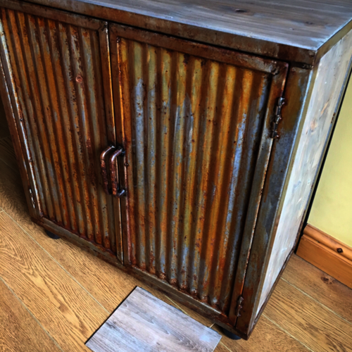 Bespoke bathroom cupboard with rusty doors