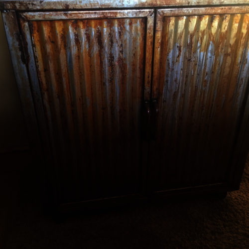 Bespoke bathroom cupboard with rusty doors