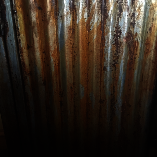 Bespoke bathroom cupboard with rusty doors