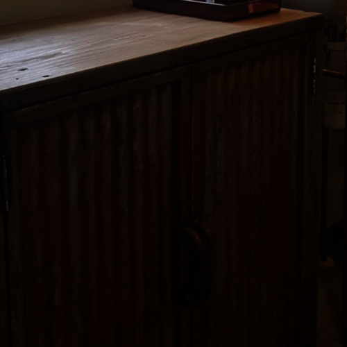 Bespoke bathroom cupboard with rusty doors