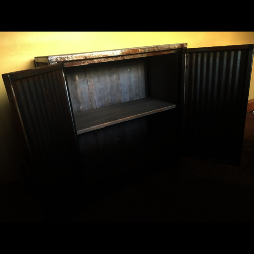 Bespoke bathroom cupboard with rusty doors