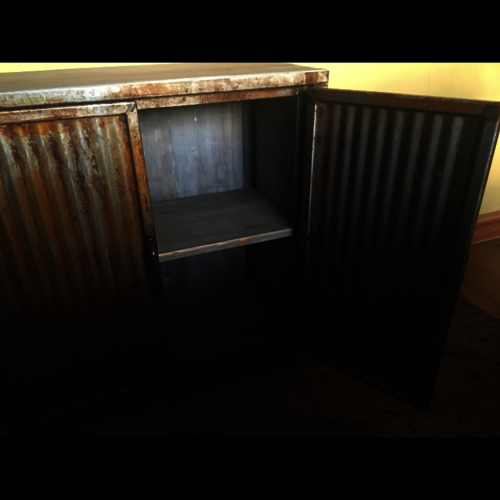 Bespoke bathroom cupboard with rusty doors