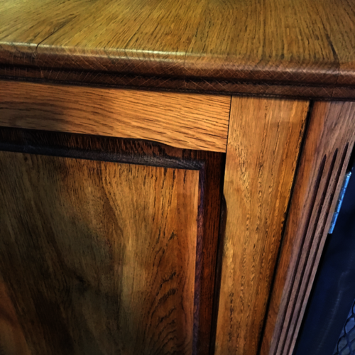 Upcycled oak cupboard with metal mesh doors