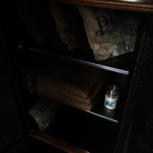 Upcycled oak cupboard with metal mesh doors