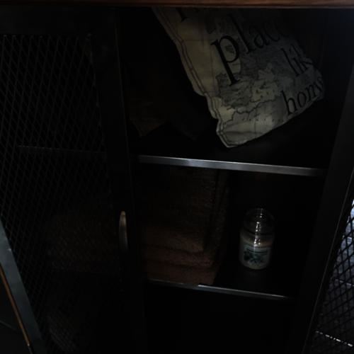 Upcycled oak cupboard with metal mesh doors