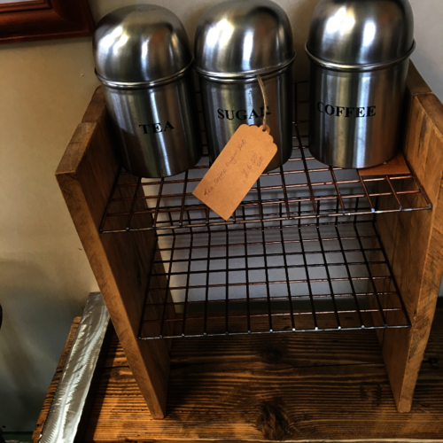 Small industrial mesh shelves with rustic wood