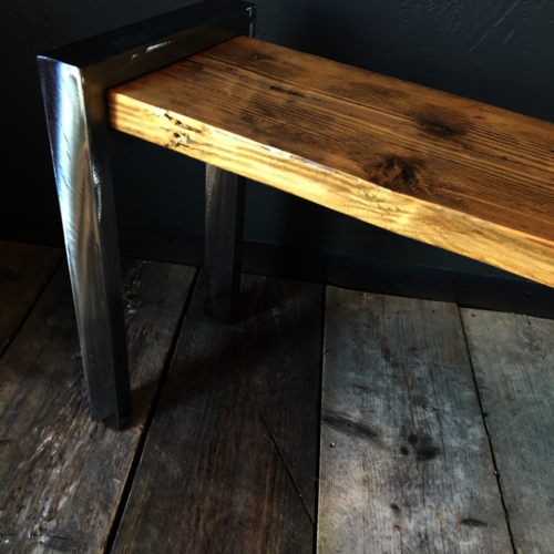 Rustic reclaimed scaffold bench with shiny metal legs