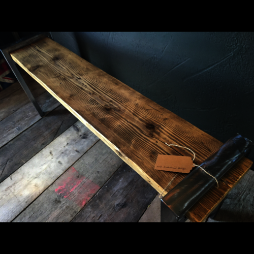 Rustic reclaimed scaffold bench with shiny metal legs