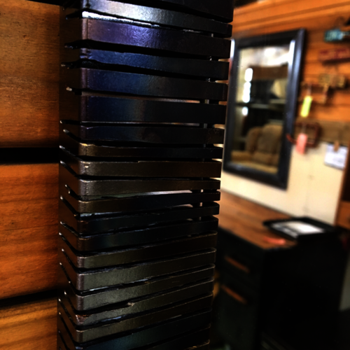 Long colourful sliced metal mirror