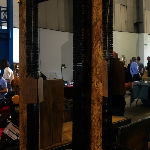 Long colourful sliced metal mirror