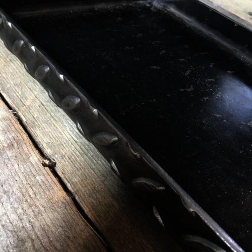 Chequer plate metal paper tray