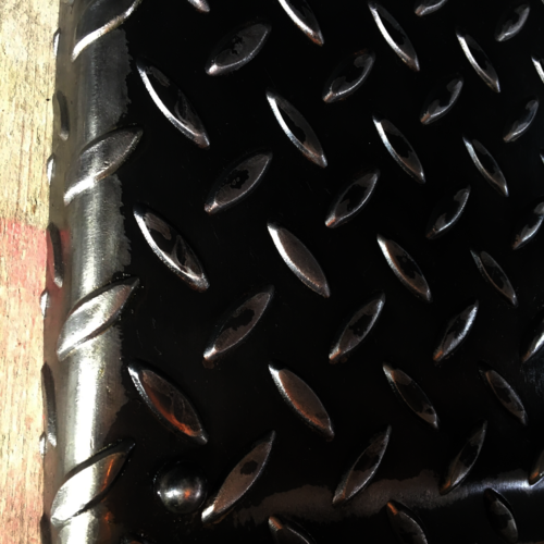 Chequer plate metal paper tray