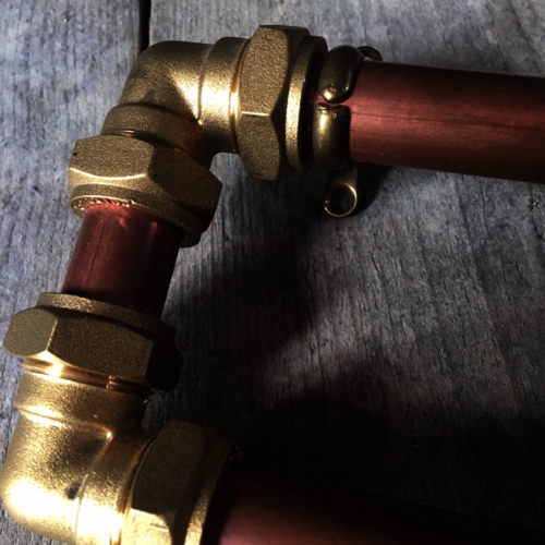 Copper and brass toilet roll/towel holder