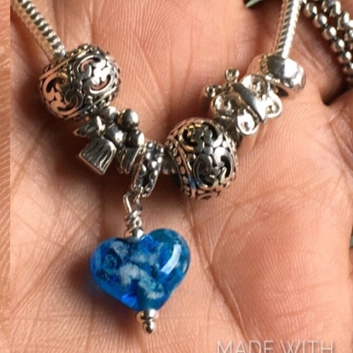 Glass heart charm