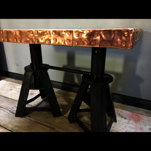Copper top coffee table with upcycled old axle stand legs