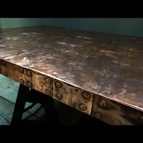 Copper top coffee table with upcycled old axle stand legs