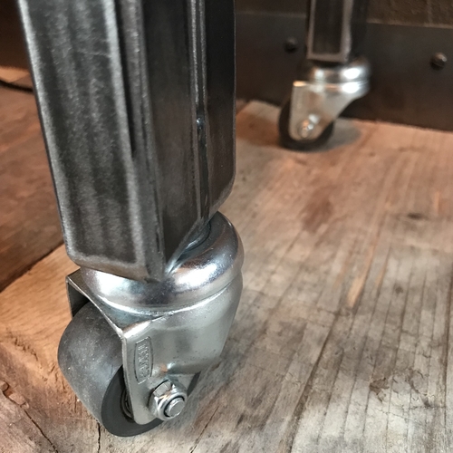Industrial console table on castors